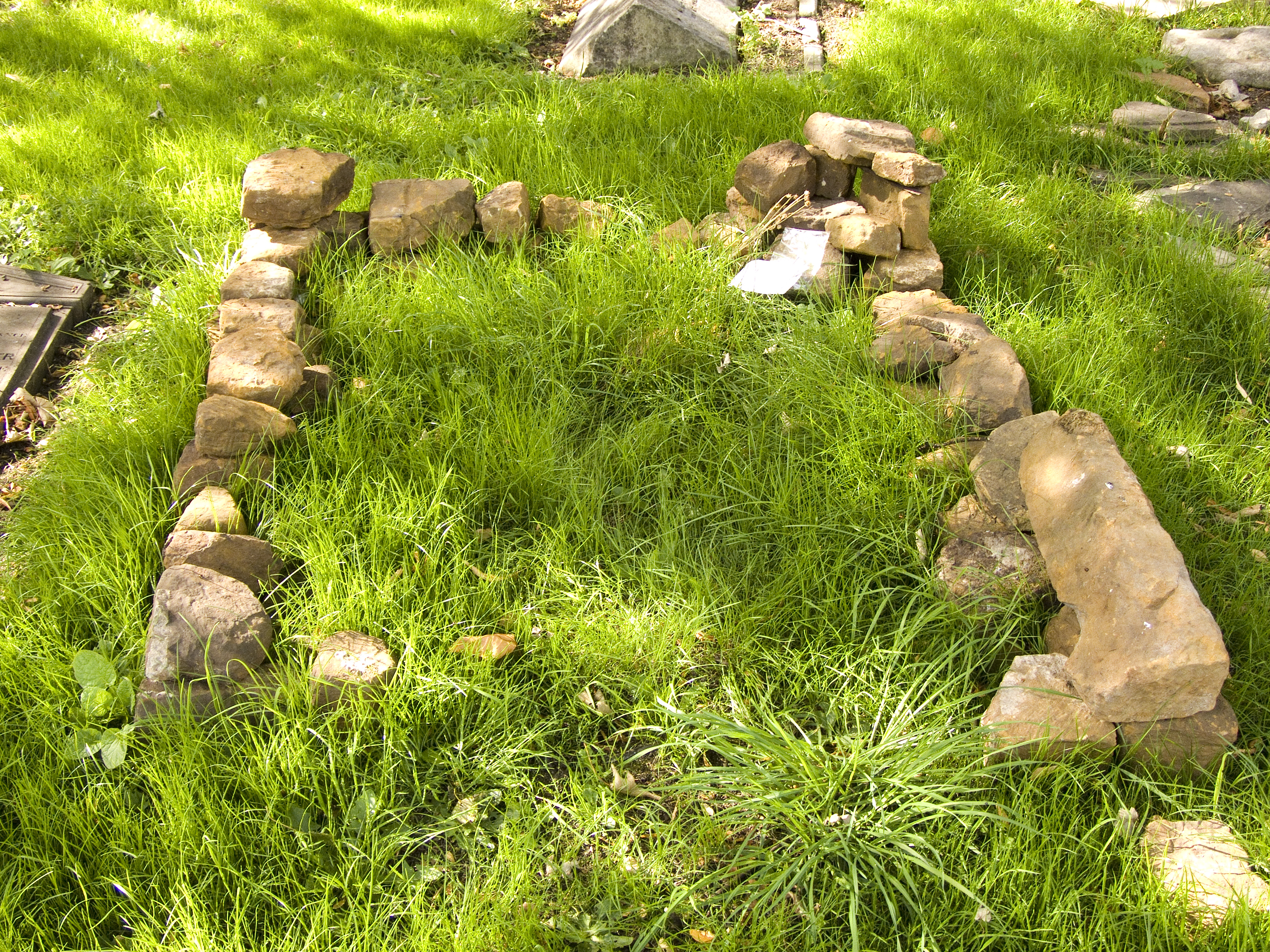 unmarked grave, arch stanton grave must be on the left…